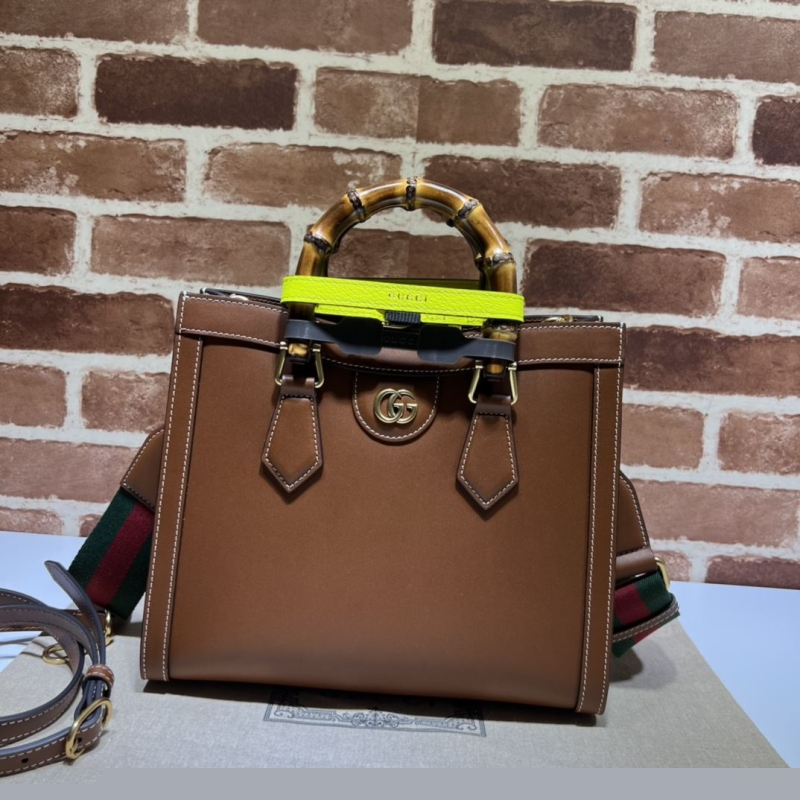 G*u*i top handle bags